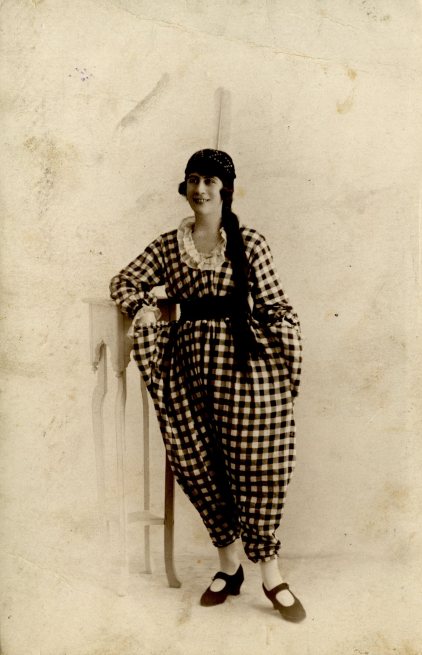 Unidentified female Music Hall performer in clown outfit, c. 1905.