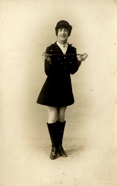 Unidentified female Music Hall performer in jockey outfit, c. 1905.